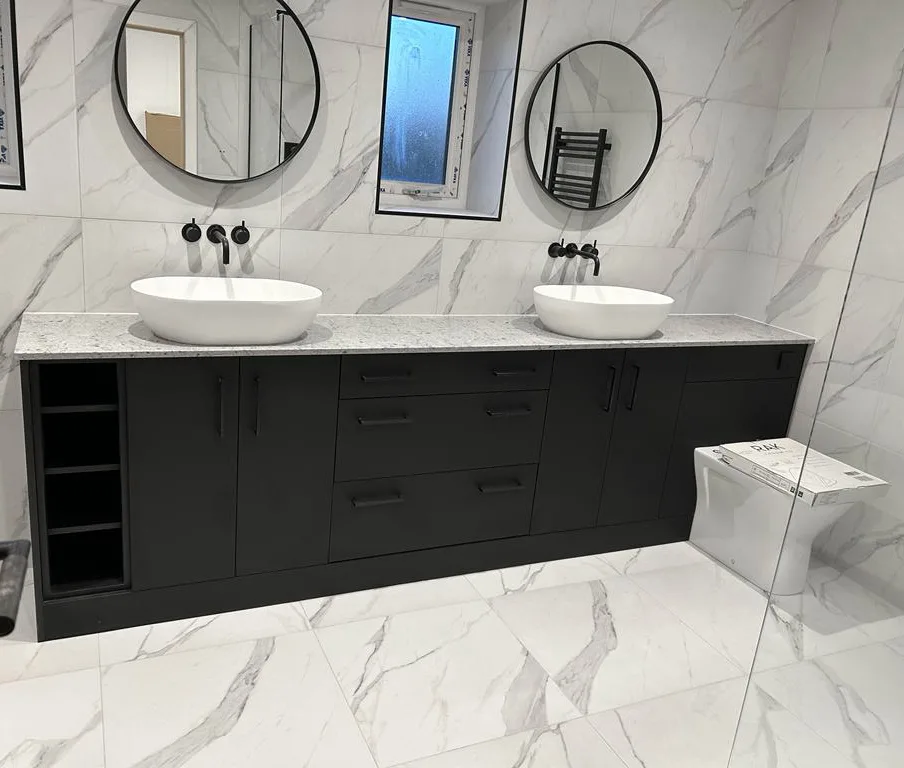 Black framed walk-in suite with freestanding bath & double basin vanity run